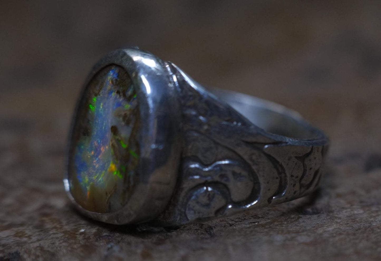 Mesmerising Colour Portal like Opal in a Unique Pirate Inspired sterling silver setting