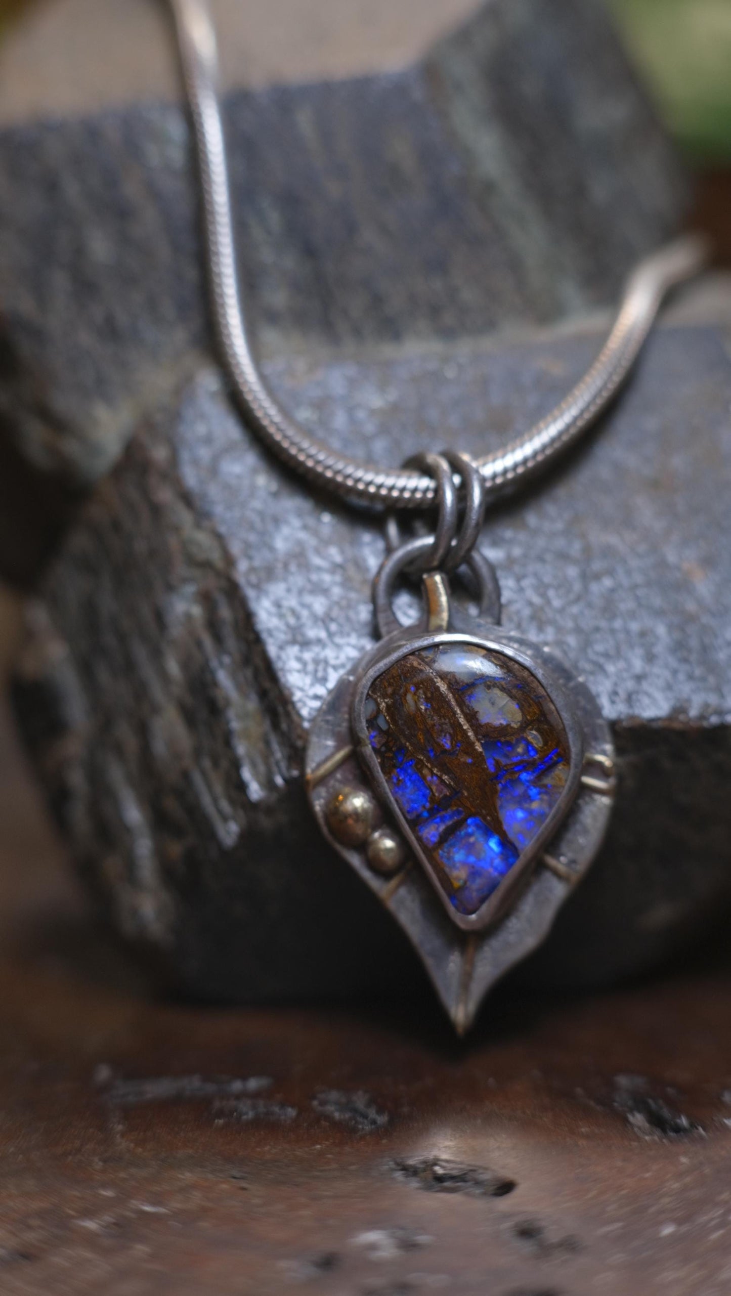 Wood Fossil Boulder Opal set in Leafy Motif Textured Silver and Gold Pendant