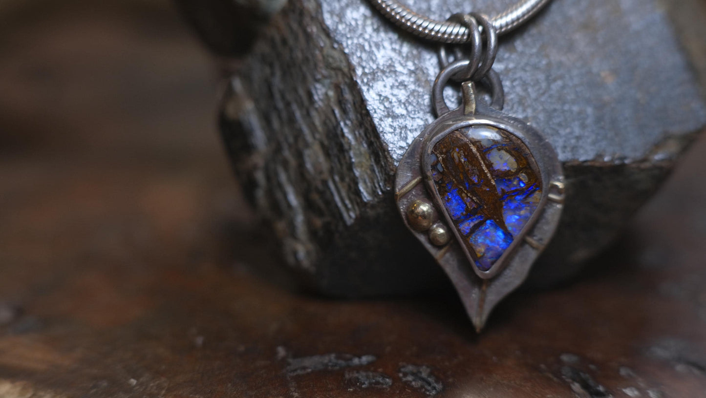 Wood Fossil Boulder Opal set in Leafy Motif Textured Silver and Gold Pendant