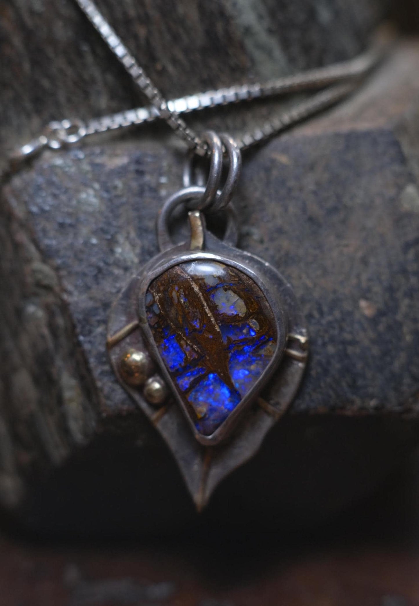 Wood Fossil Boulder Opal set in Leafy Motif Textured Silver and Gold Pendant
