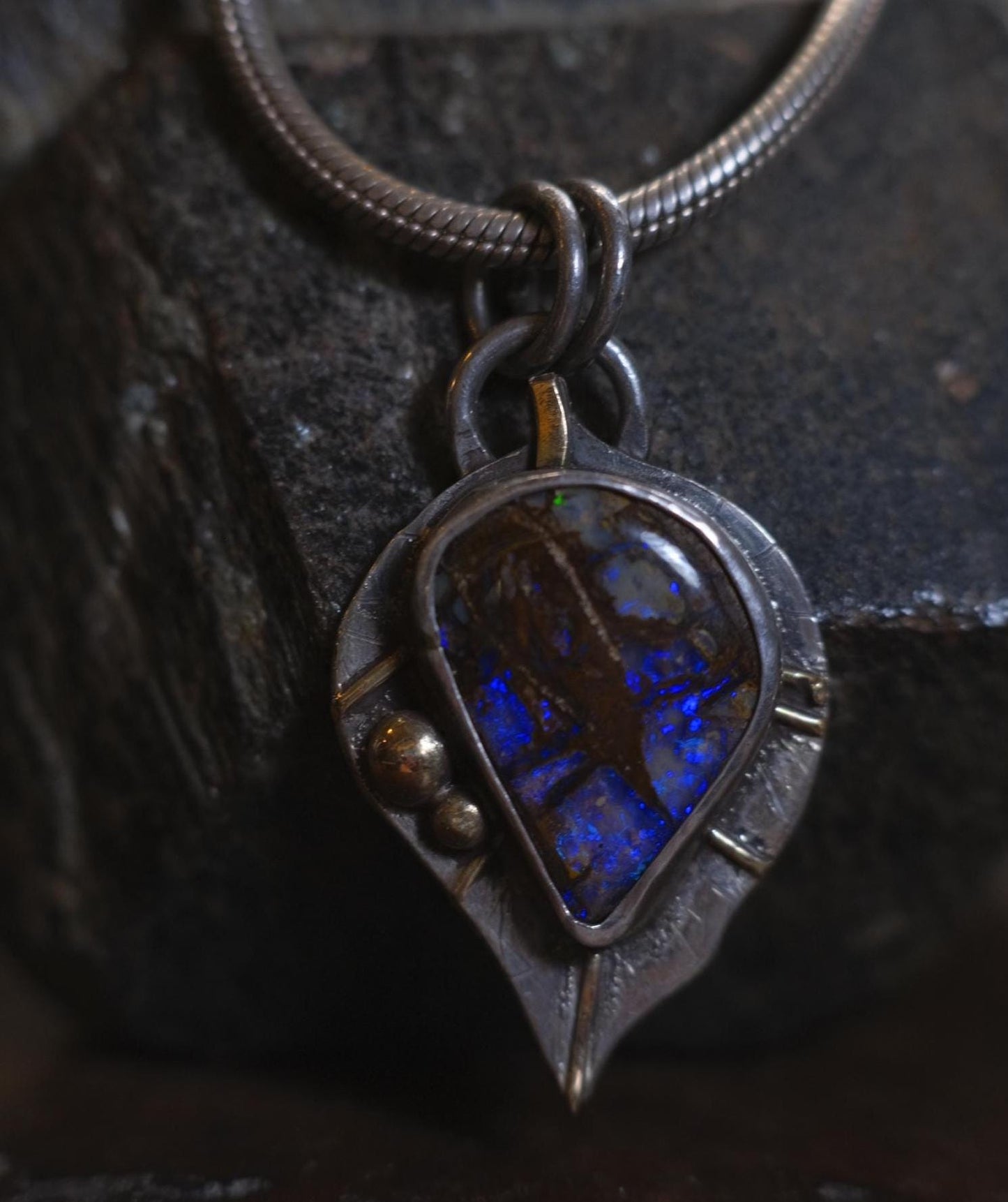 Wood Fossil Boulder Opal set in Leafy Motif Textured Silver and Gold Pendant
