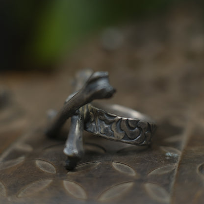 Handmade sterling silver crossbones ring with rugged oxidised pirate-inspired texture