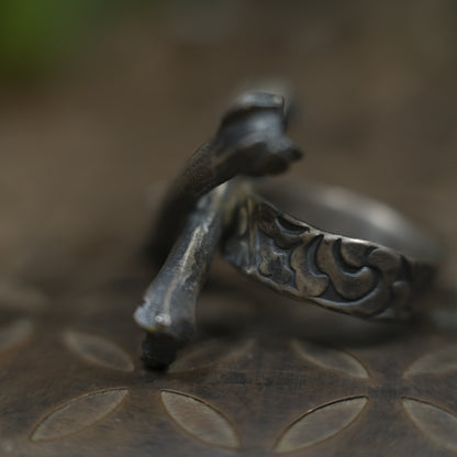 Handmade sterling silver crossbones ring with rugged oxidised pirate-inspired texture