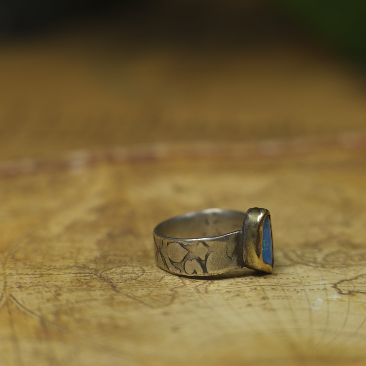 Bold Electric Blue Australian Opal Set in 9 ct Gold on a textured Sterling Silver Ring