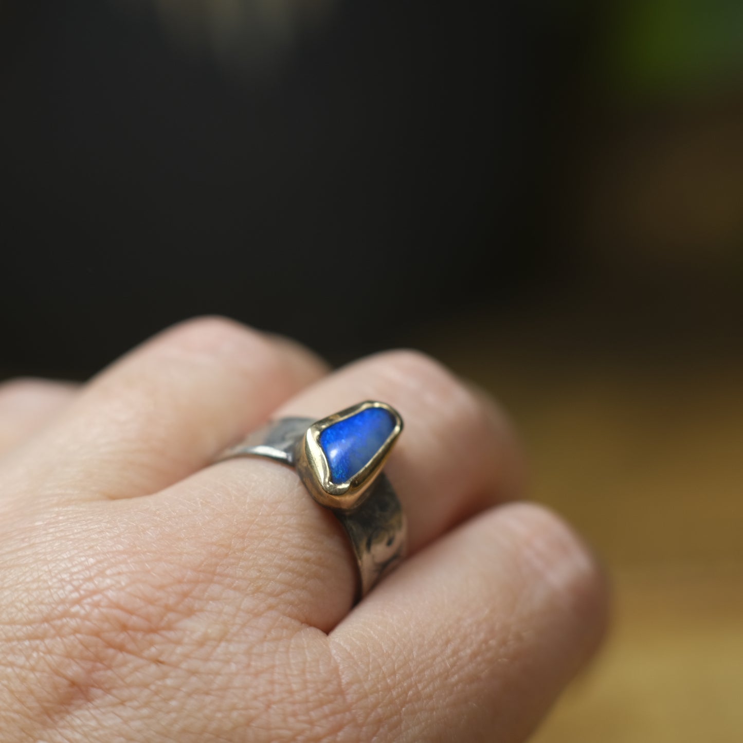 Bold Electric Blue Australian Opal Set in 9 ct Gold on a textured Sterling Silver Ring