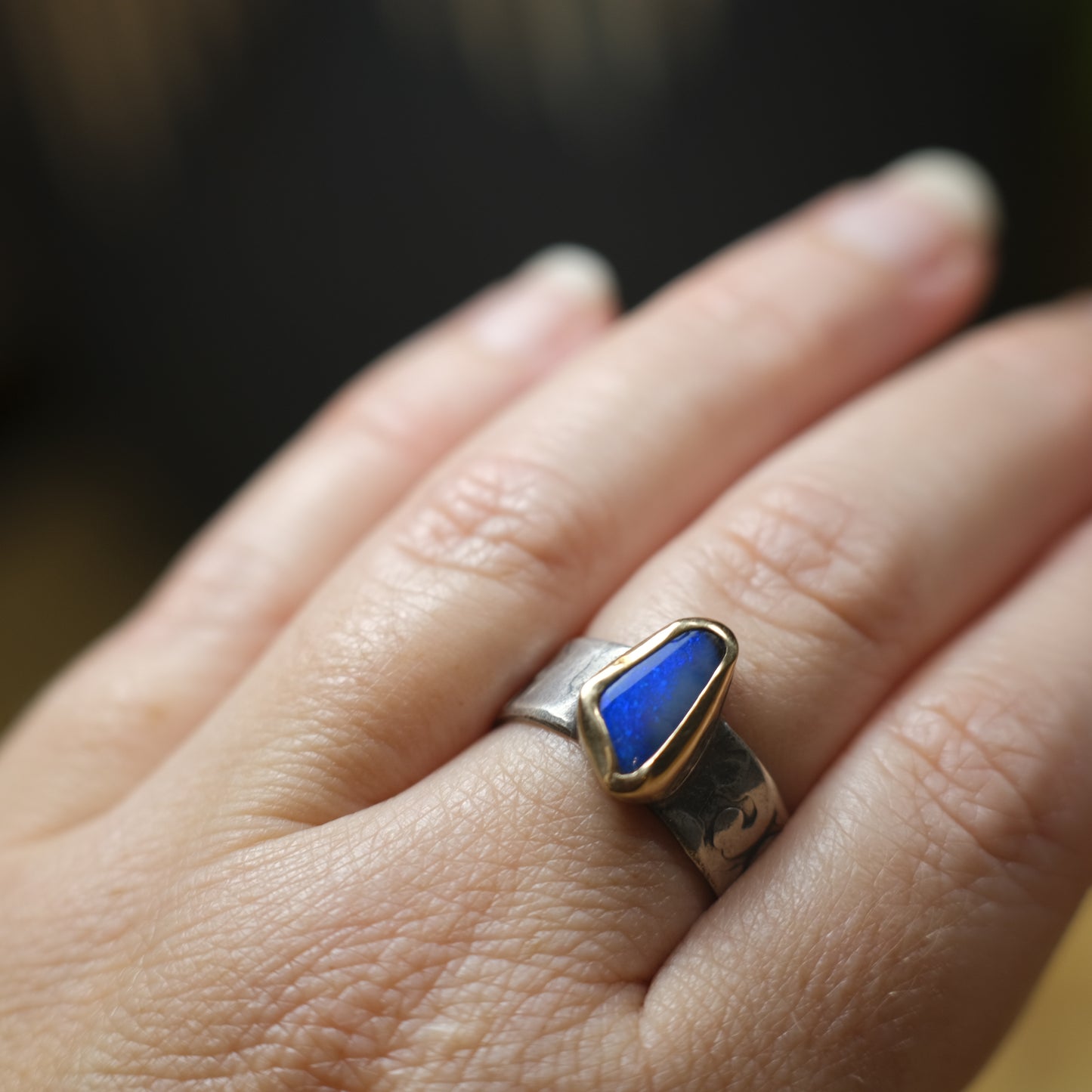 Bold Electric Blue Australian Opal Set in 9 ct Gold on a textured Sterling Silver Ring