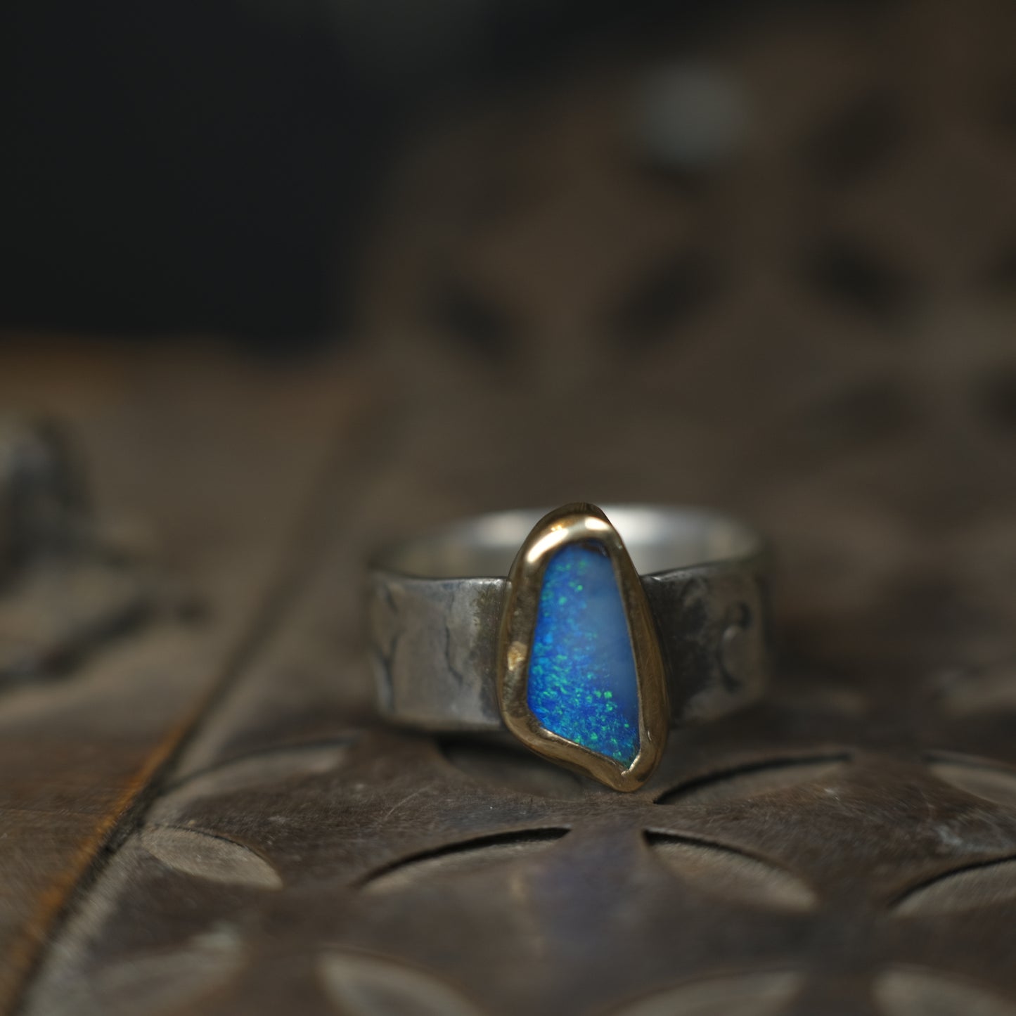 Bold Electric Blue Australian Opal Set in 9 ct Gold on a textured Sterling Silver Ring