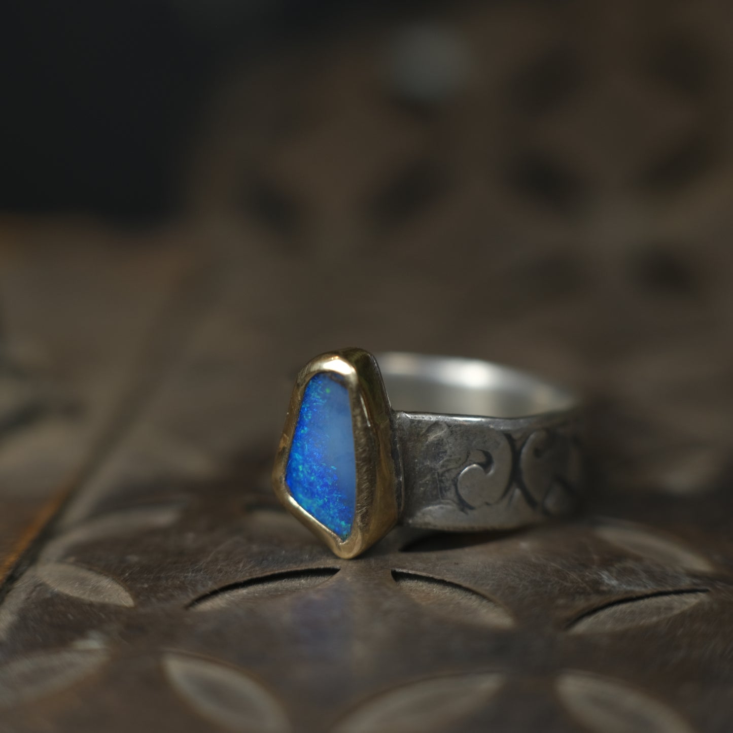 Bold Electric Blue Australian Opal Set in 9 ct Gold on a textured Sterling Silver Ring