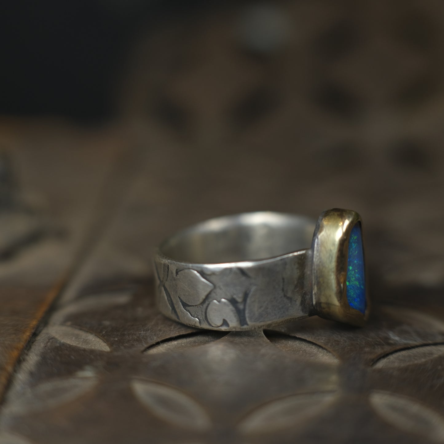 Bold Electric Blue Australian Opal Set in 9 ct Gold on a textured Sterling Silver Ring