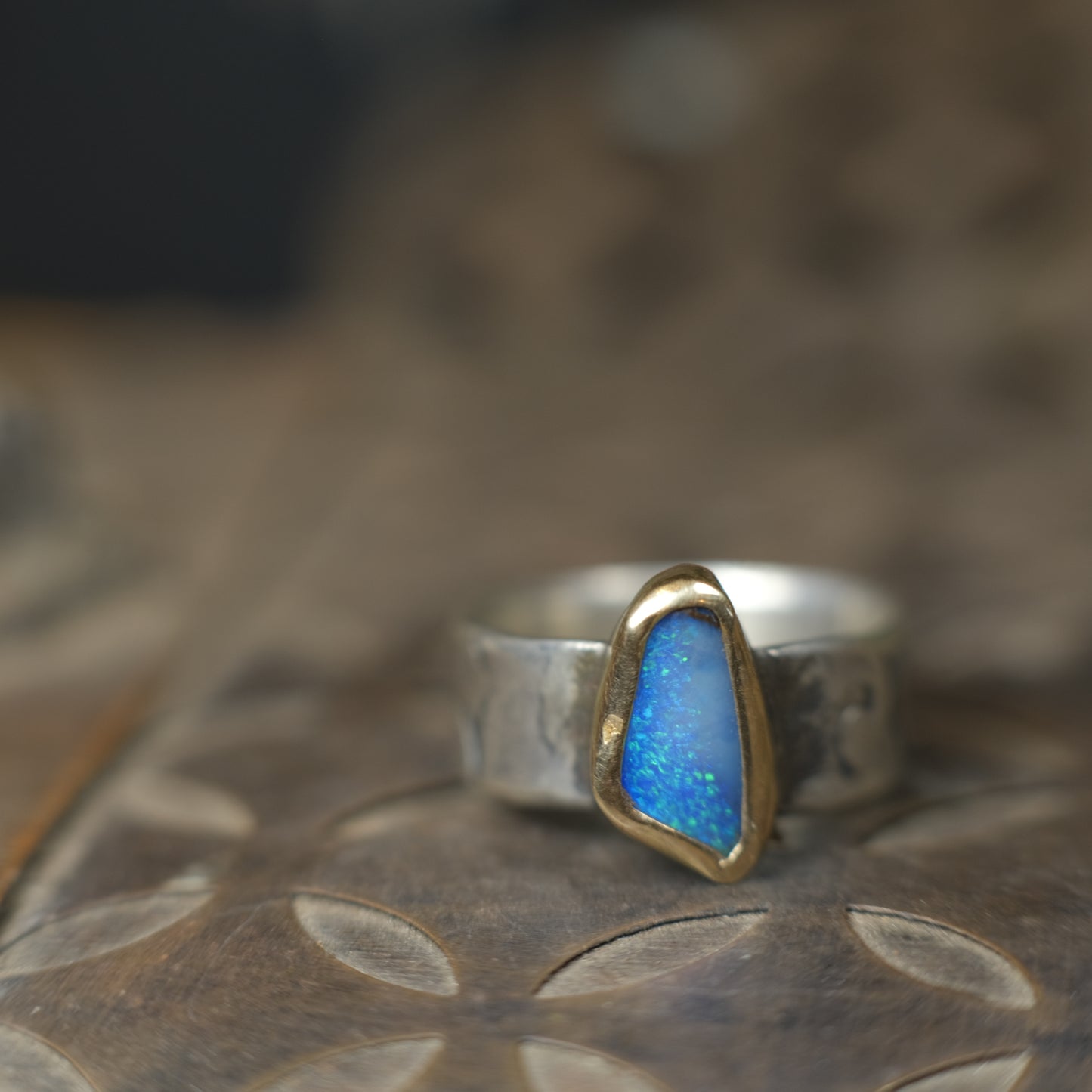 Bold Electric Blue Australian Opal Set in 9 ct Gold on a textured Sterling Silver Ring