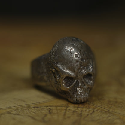 Chunky handmade sterling silver skull ring with rugged oxidised finish