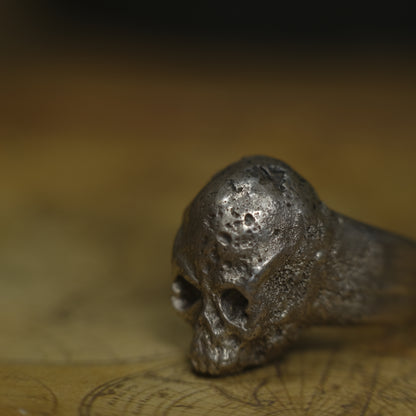 Chunky handmade sterling silver skull ring with rugged oxidised finish