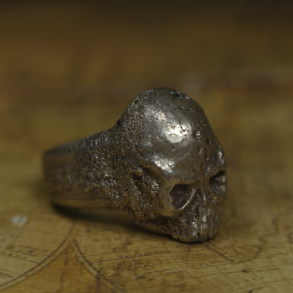 Chunky handmade sterling silver skull ring with rugged oxidised finish