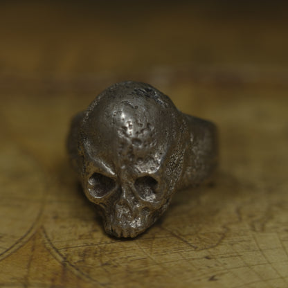 Chunky handmade sterling silver skull ring with rugged oxidised finish