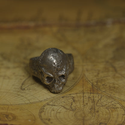 Chunky handmade sterling silver skull ring with rugged oxidised finish