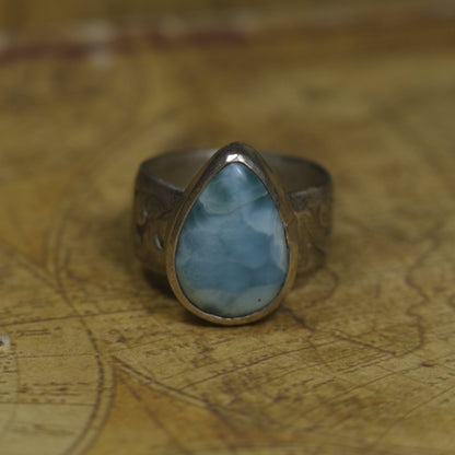 Larimar pirate ring with pale blue stone and textured oxidised sterling silver band
