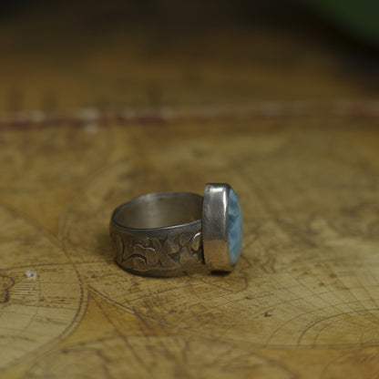 Larimar pirate ring with pale blue stone and textured oxidised sterling silver band