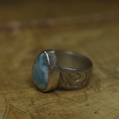 Larimar pirate ring with pale blue stone and textured oxidised sterling silver band