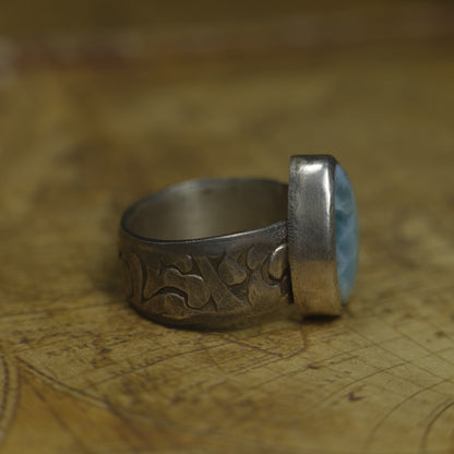 Larimar pirate ring with pale blue stone and textured oxidised sterling silver band