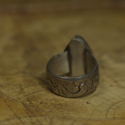 Larimar pirate ring with pale blue stone and textured oxidised sterling silver band