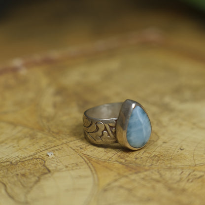 Larimar pirate ring with pale blue stone and textured oxidised sterling silver band