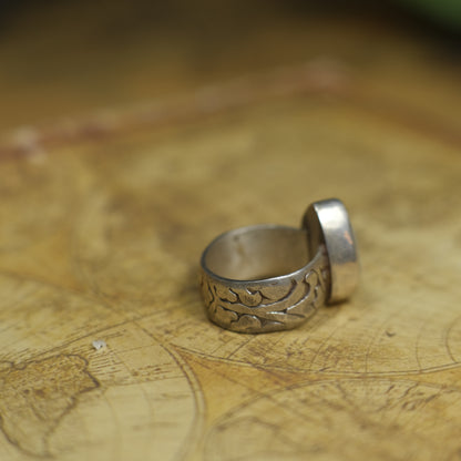 Larimar pirate ring with pale blue stone and textured oxidised sterling silver band