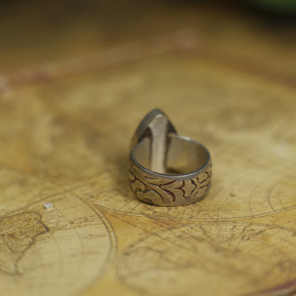 Larimar pirate ring with pale blue stone and textured oxidised sterling silver band