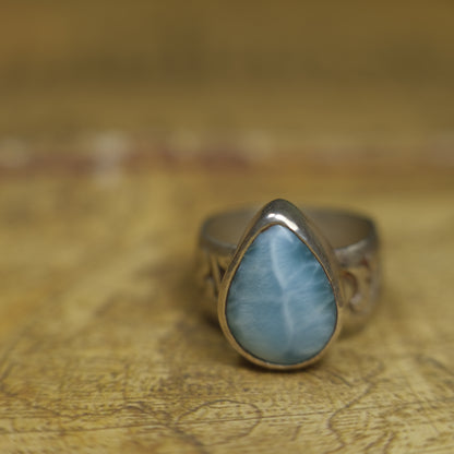 Larimar pirate ring with pale blue stone and textured oxidised sterling silver band