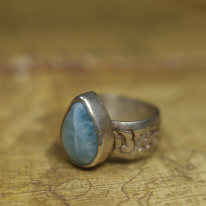 Larimar pirate ring with pale blue stone and textured oxidised sterling silver band