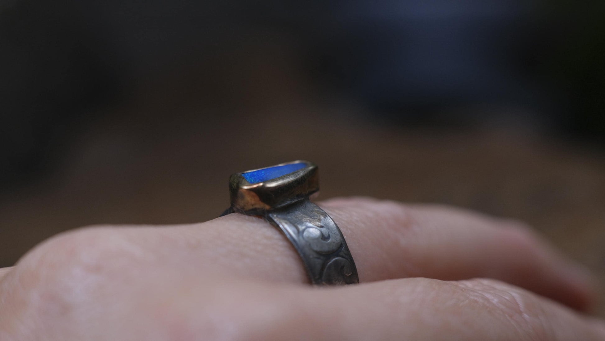 Bold Electric Blue Australian Opal Set in 9 ct Gold on a textured Sterling Silver Ring