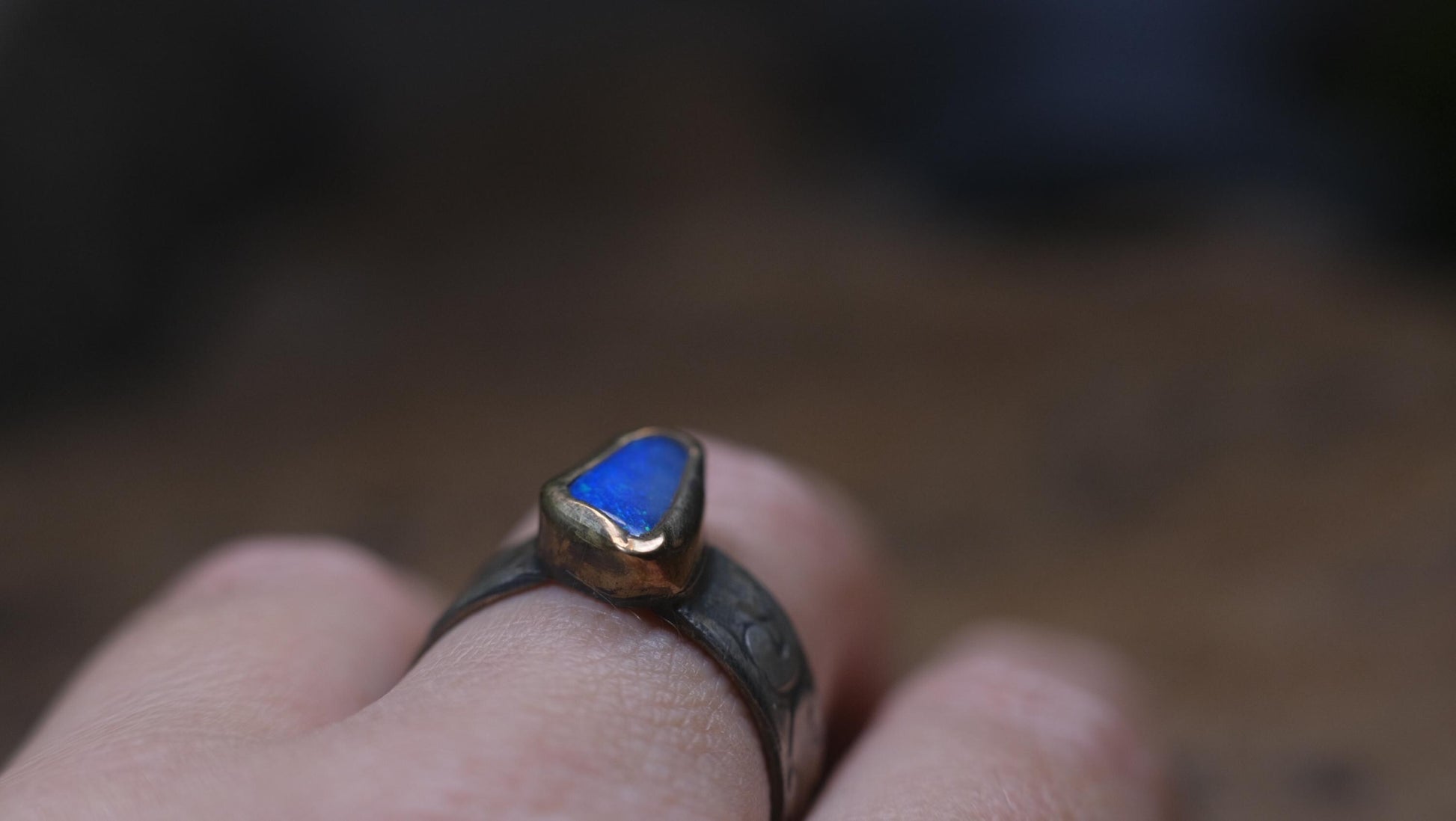Bold Electric Blue Australian Opal Set in 9 ct Gold on a textured Sterling Silver Ring