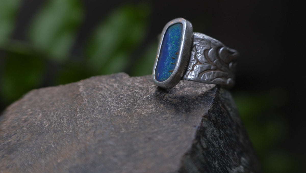 Blue Australian boulder opal ring in pirate-inspired textured sterling silver, size 7