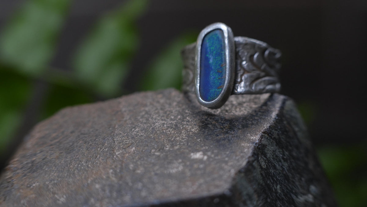 Blue Australian boulder opal ring in pirate-inspired textured sterling silver, size 7