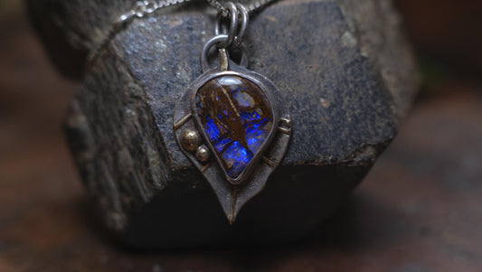 Wood Fossil Boulder Opal set in Leafy Motif Textured Silver and Gold Pendant