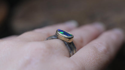 Australian boulder opal gemstone in 9ct gold bezel setting