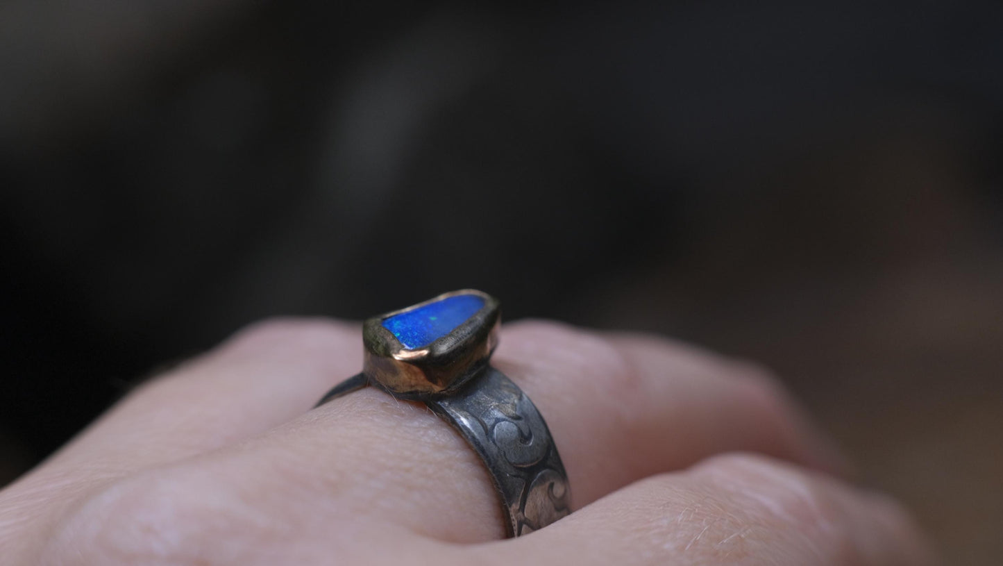 Bold Electric Blue Australian Opal Set in 9 ct Gold on a textured Sterling Silver Ring