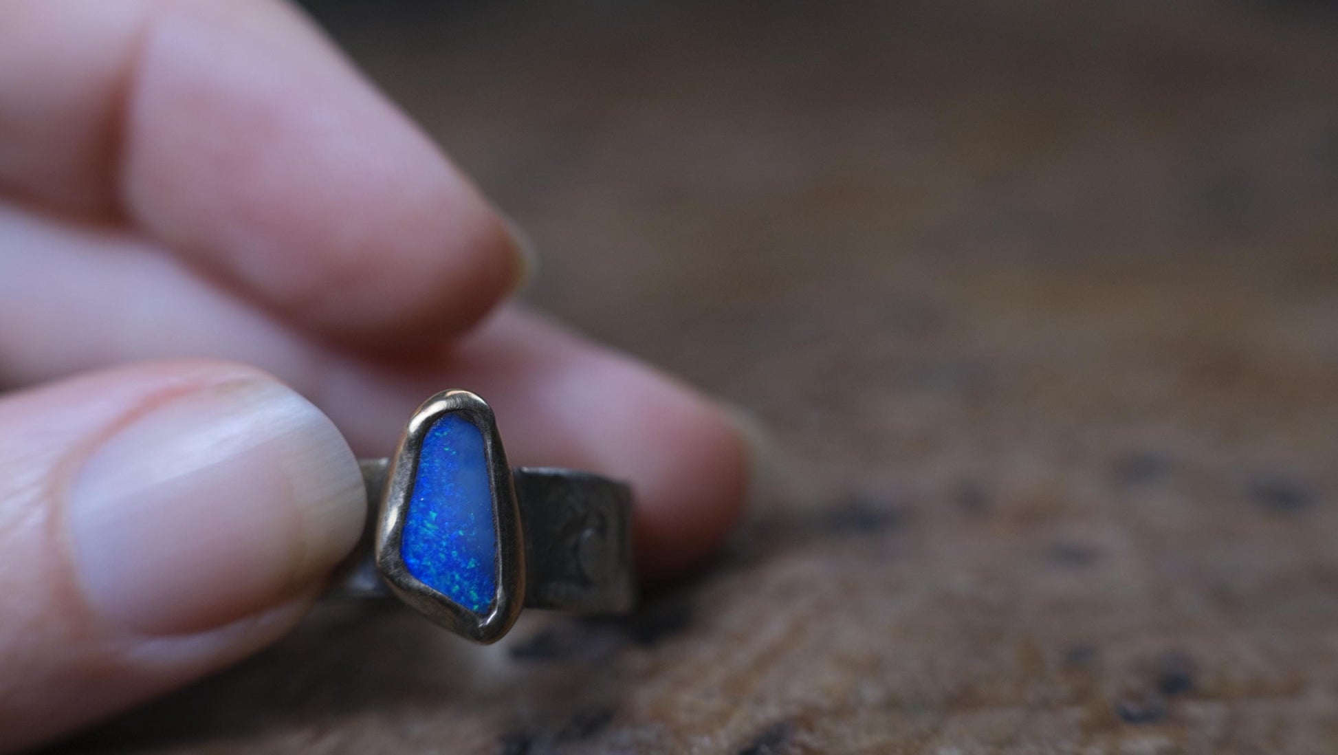 Bold Electric Blue Australian Opal Set in 9 ct Gold on a textured Sterling Silver Ring