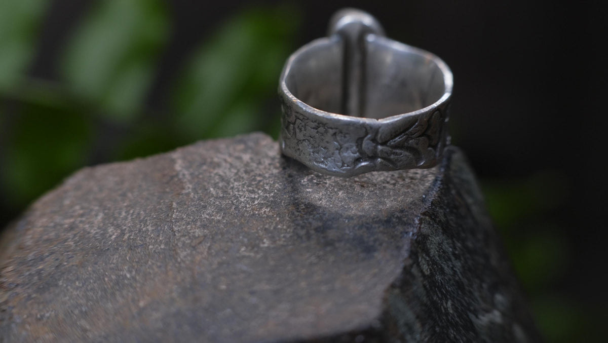 Blue Australian boulder opal ring in pirate-inspired textured sterling silver, size 7