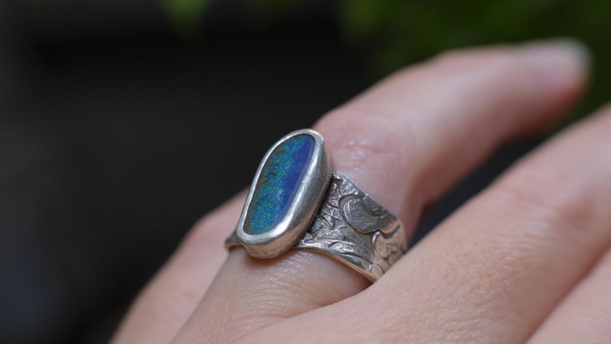 Blue Australian boulder opal ring in pirate-inspired textured sterling silver, size 7