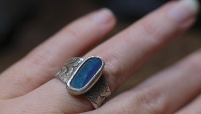 Blue Australian boulder opal ring in pirate-inspired textured sterling silver, size 7