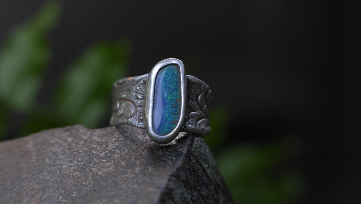 Blue Australian boulder opal ring in pirate-inspired textured sterling silver, size 7