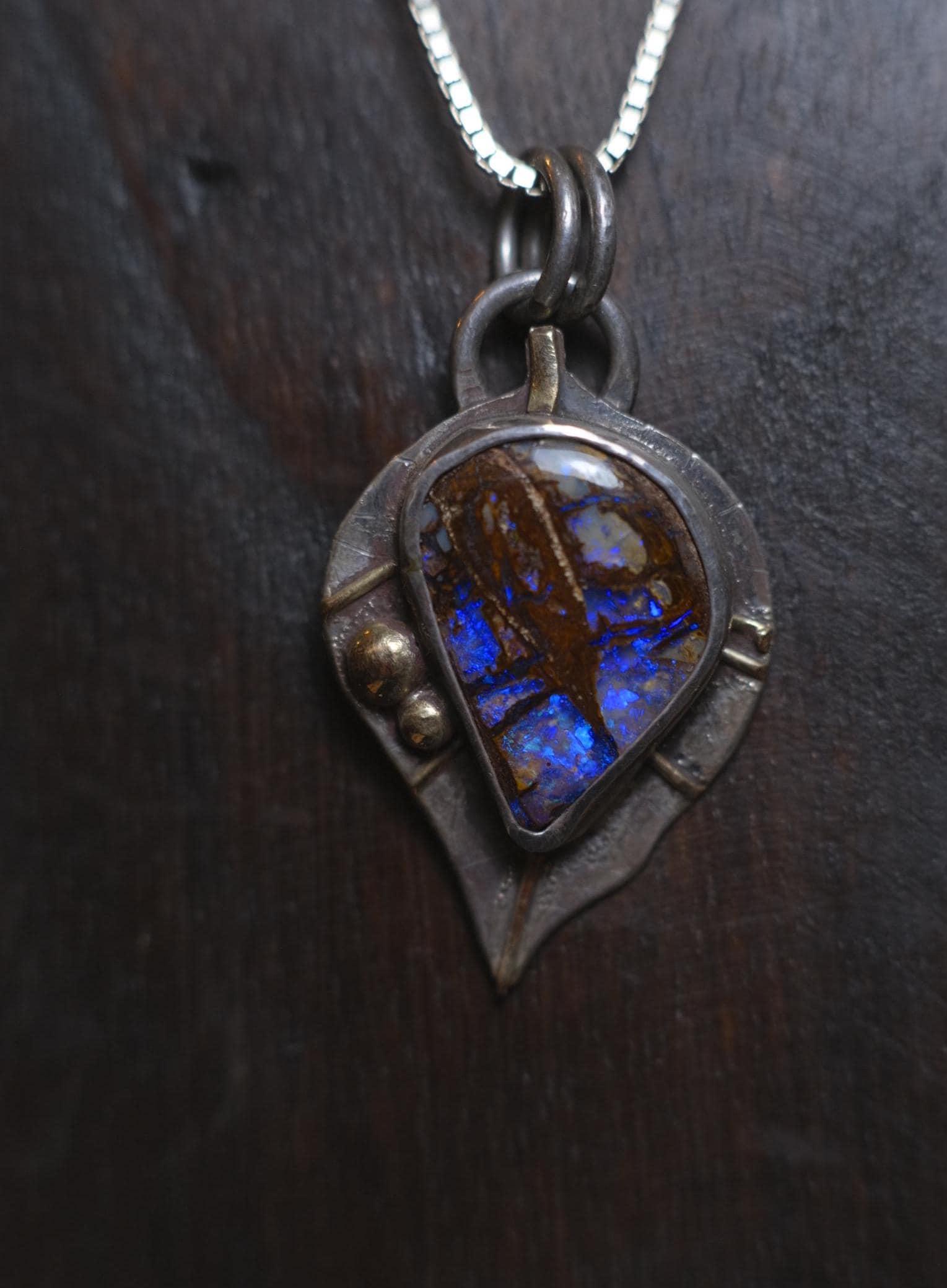 Wood Fossil Boulder Opal set in Leafy Motif Textured Silver and Gold Pendant