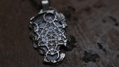 Handmade sterling silver Metatron's Cube talisman with oxidised sacred geometry design
