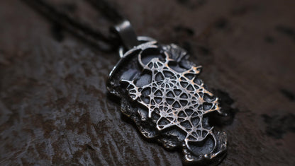 Handmade sterling silver Metatron's Cube talisman with oxidised sacred geometry design