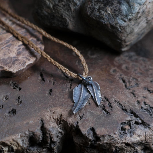 Handcrafted Sterling Silver Leaf Duo Pendant. Ready to wear on adjustable braided cord.
