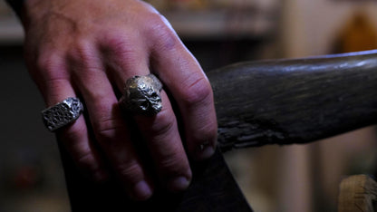 Chunky handmade sterling silver skull ring with rugged oxidised finish