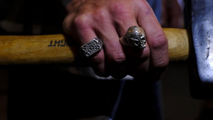 Chunky handmade sterling silver skull ring with rugged oxidised finish
