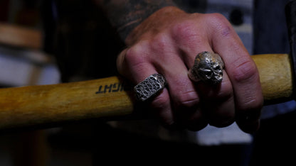 Chunky handmade sterling silver skull ring with rugged oxidised finish