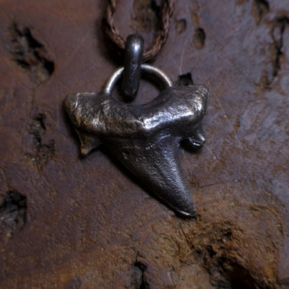 Sterling silver shark tooth talisman cast from a genuine fossil tooth on adjustable cord