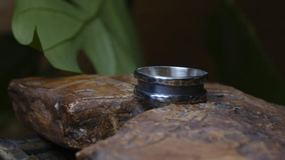 The Valley wide sterling silver ring with hammered edges and dark oxidised centre